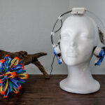 Neuro RX headset on manikin and hoberman sphere